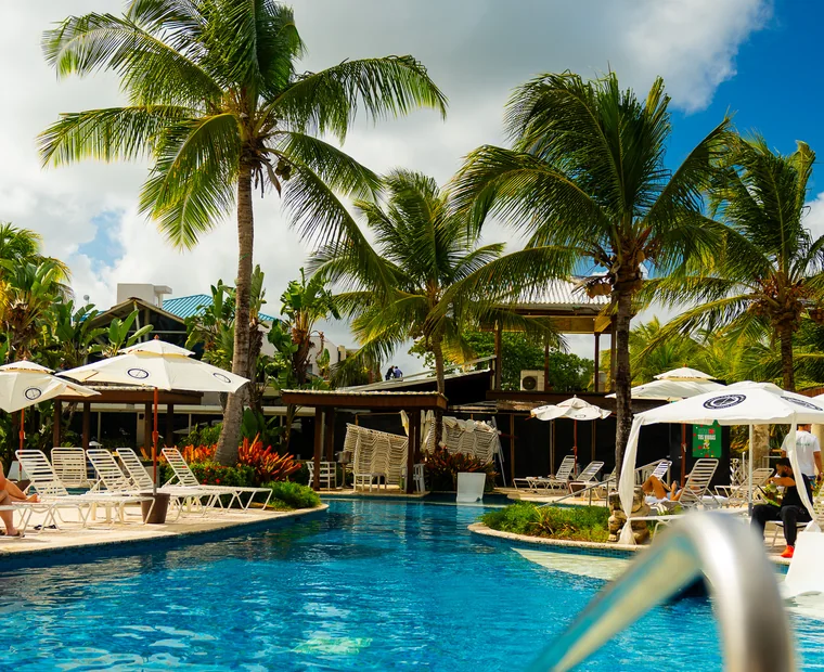 Vivo Beach Club pool and palms